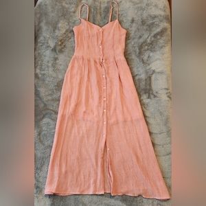 Light pink dress, light weight. Perfect for the summer. Looks brand new.